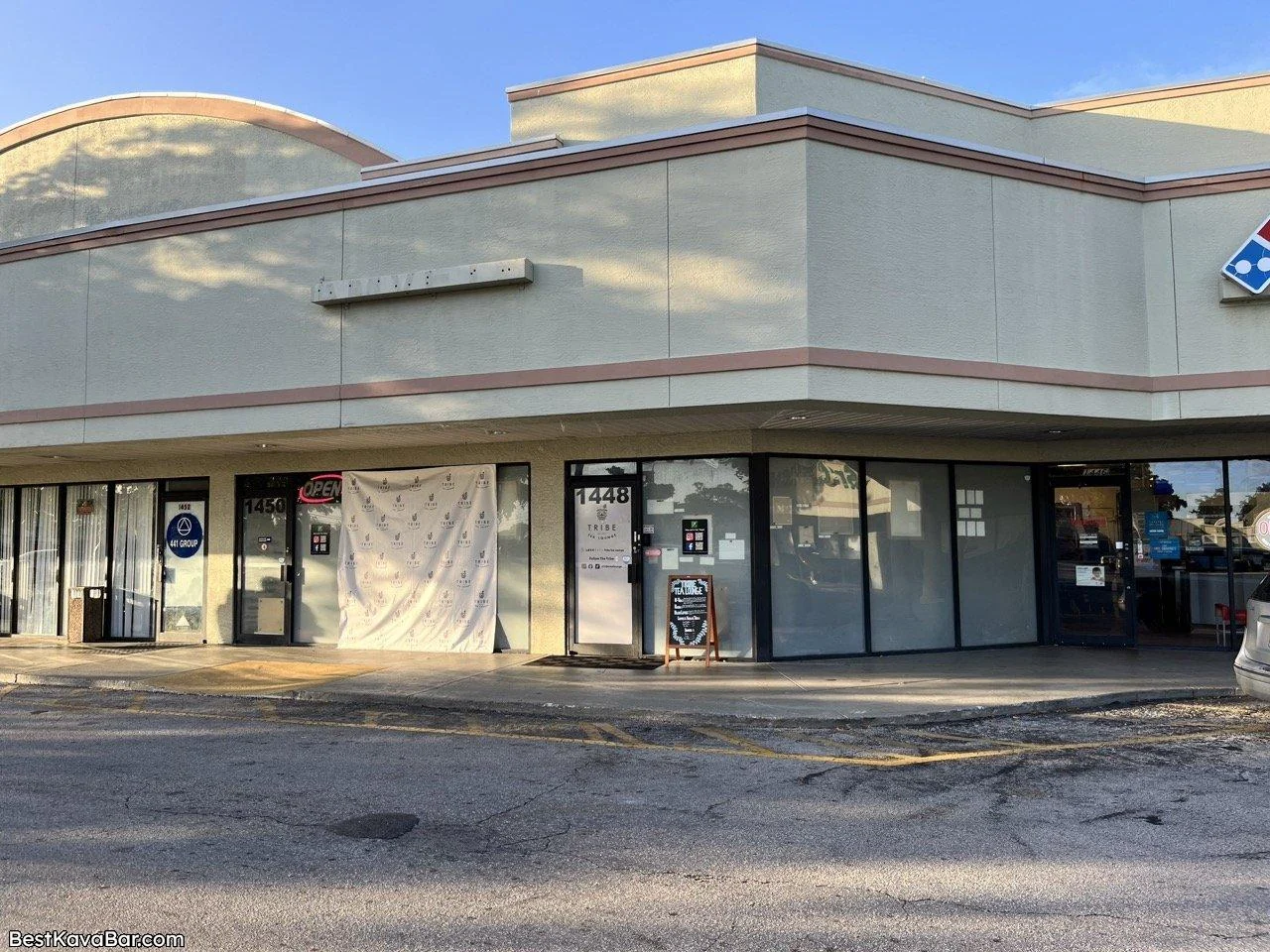 Tribe Tea Lounge’s storefront displays the street number 1448 in a Margate shopping plaza